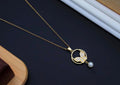Elara Halo – Butterfly Pearl Necklace